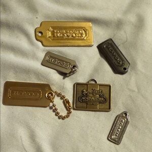 6 Coach Gold and Silver bag tag